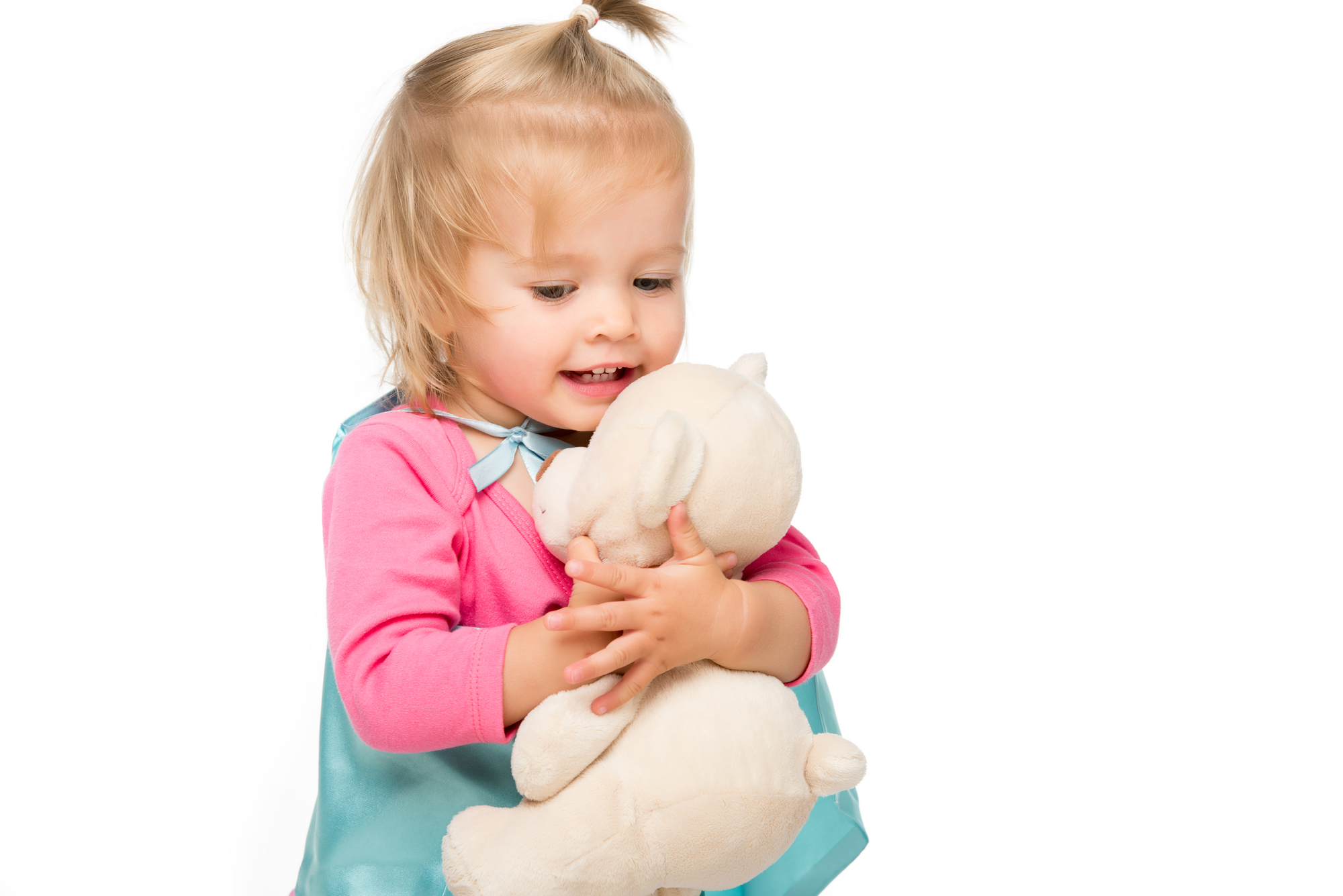 girl cuddling teddy in childcare centre Perth